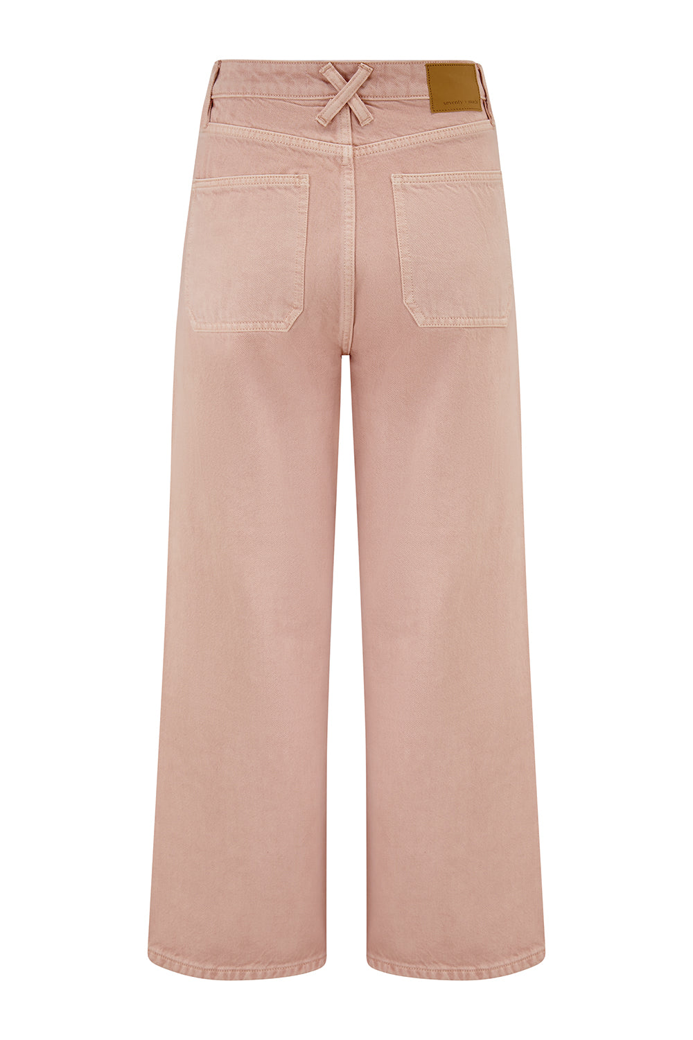 light pink high waisted, wide, cropped jeans with big pockets on a white background